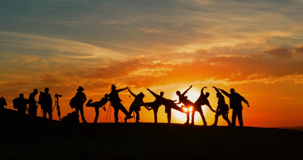 Image of a group of friends watching the sunset