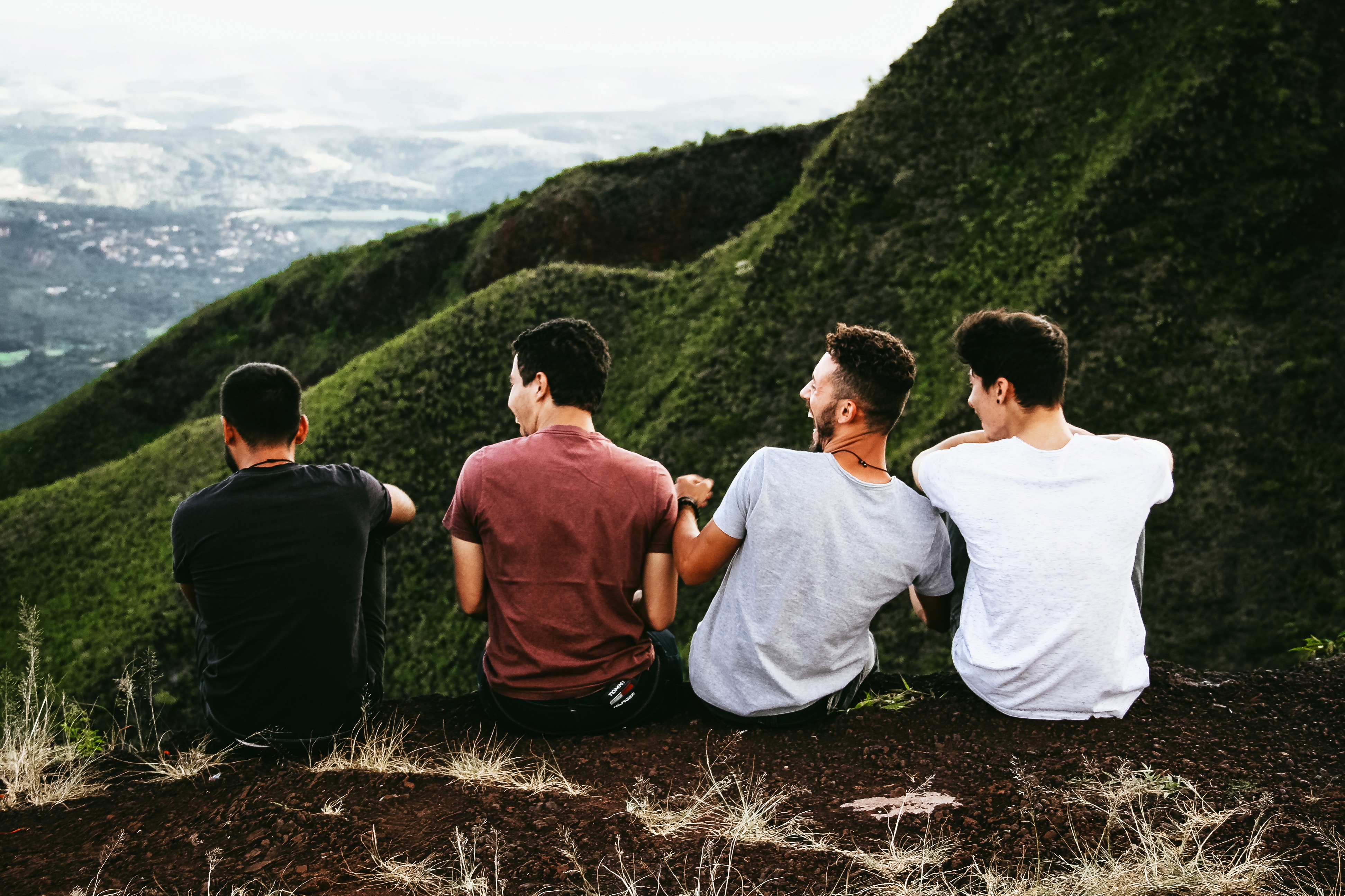 Image of a group of four male friends on a mou