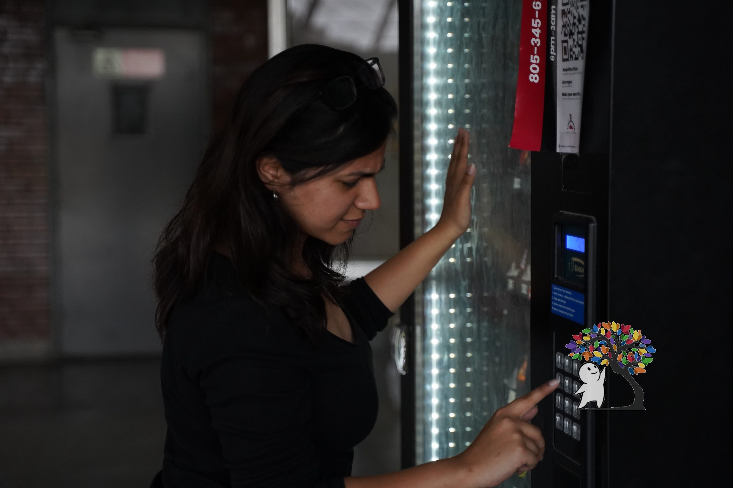 Woman Being Impatient at the Vending Machine